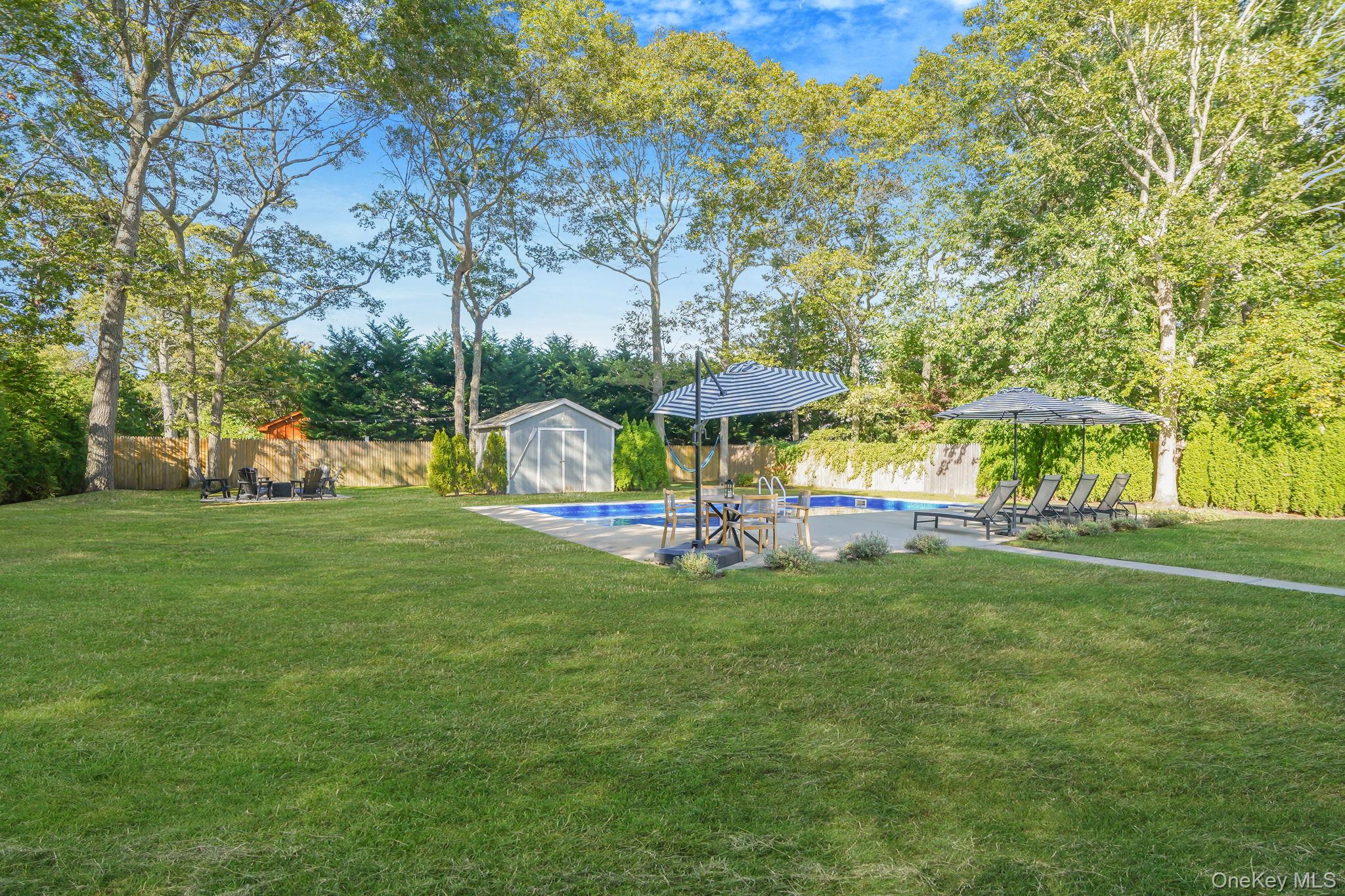 138 West Tiana Road Hampton Bays, NY 11946 - Photo 19 of 24 a view of a park with large trees