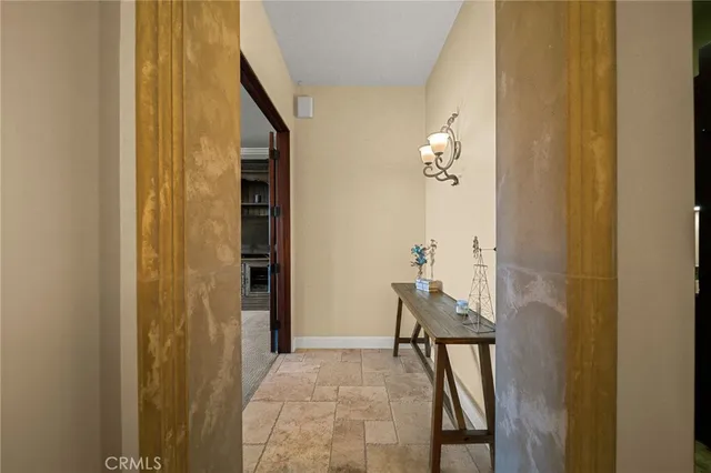 a bedroom with bed and window