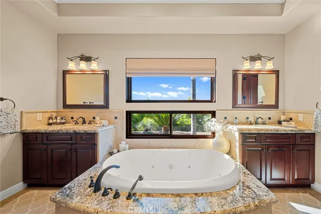 a building outdoor space with patio furniture and garden