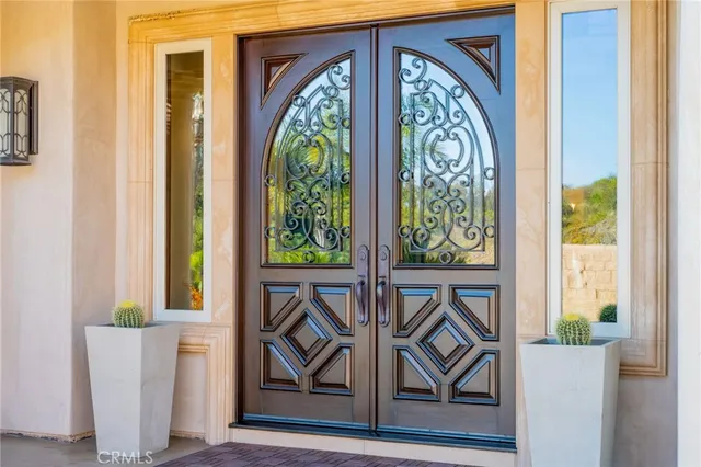 a kitchen with stainless steel appliances granite countertop a lot of counter top space and wooden floor