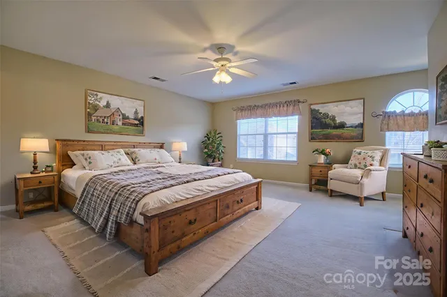 an aerial view of residential houses and outdoor space