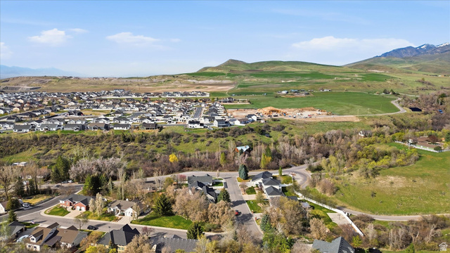 353 Robin Street Smithfield, UT 84335 - Photo 62 of 70 Aerial perspective of suburban area with a mountain backdrop