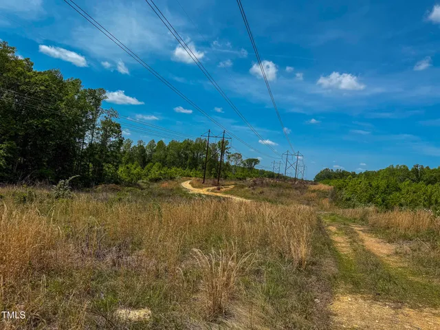 a view of a yard with an outdoor space