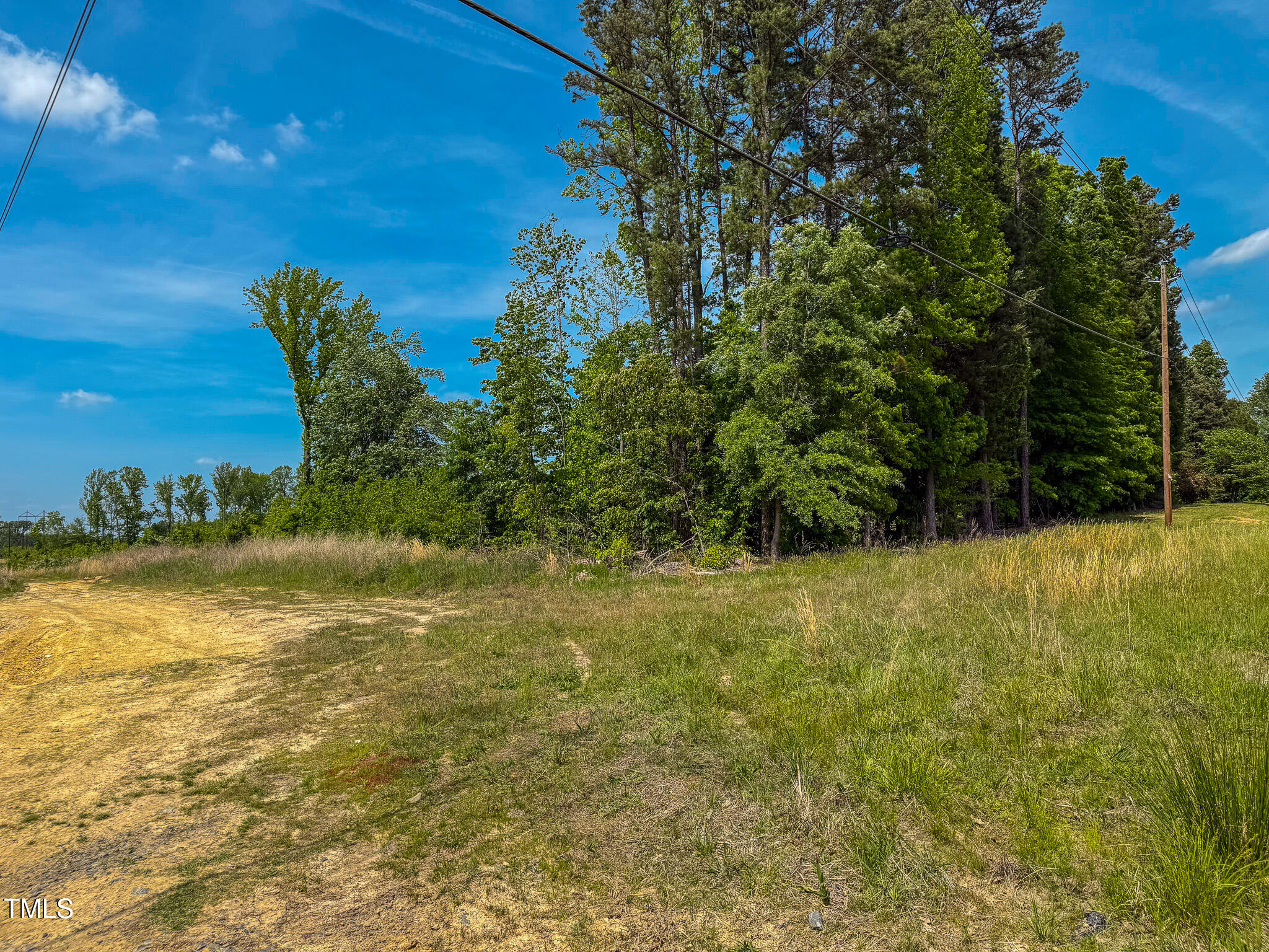 167.10 Leasburg Road Roxboro, NC 27573 - Photo 25 of 26 a view of a yard with an outdoor space