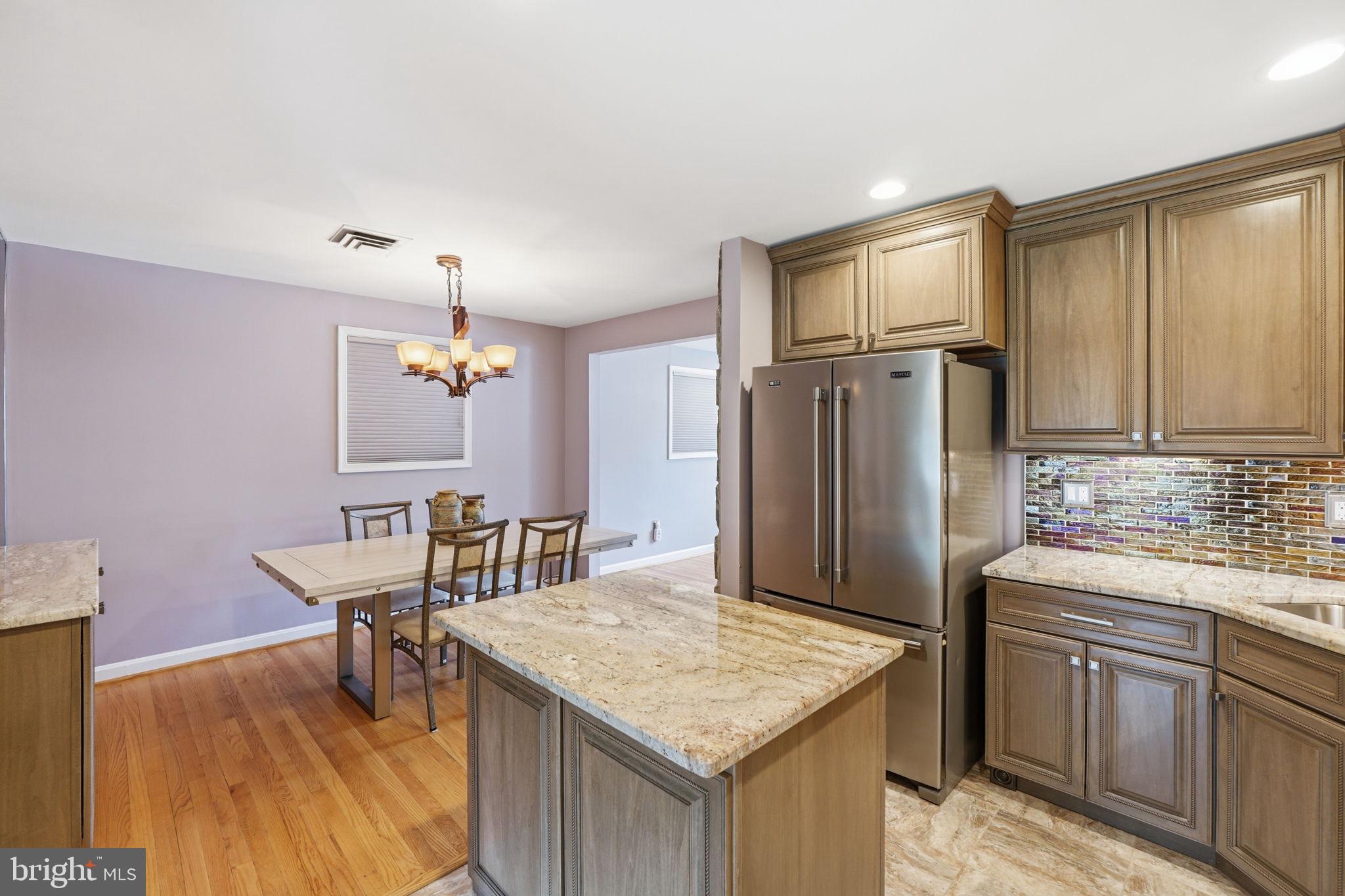 10713 Gregory Street Silver Spring, MD 20901 - Photo 9 of 38 Center Island for additional convenience