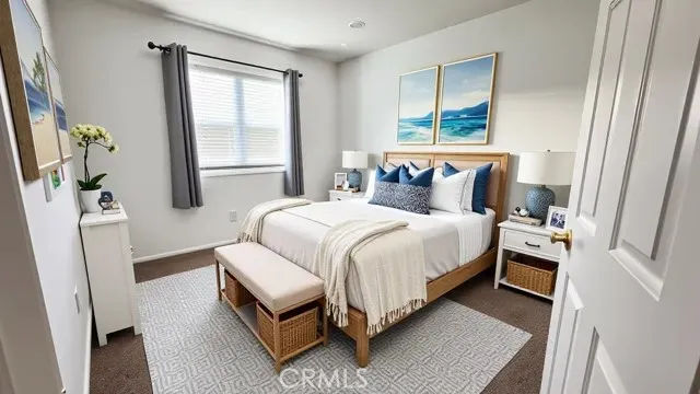 a bed room with a bed and a window