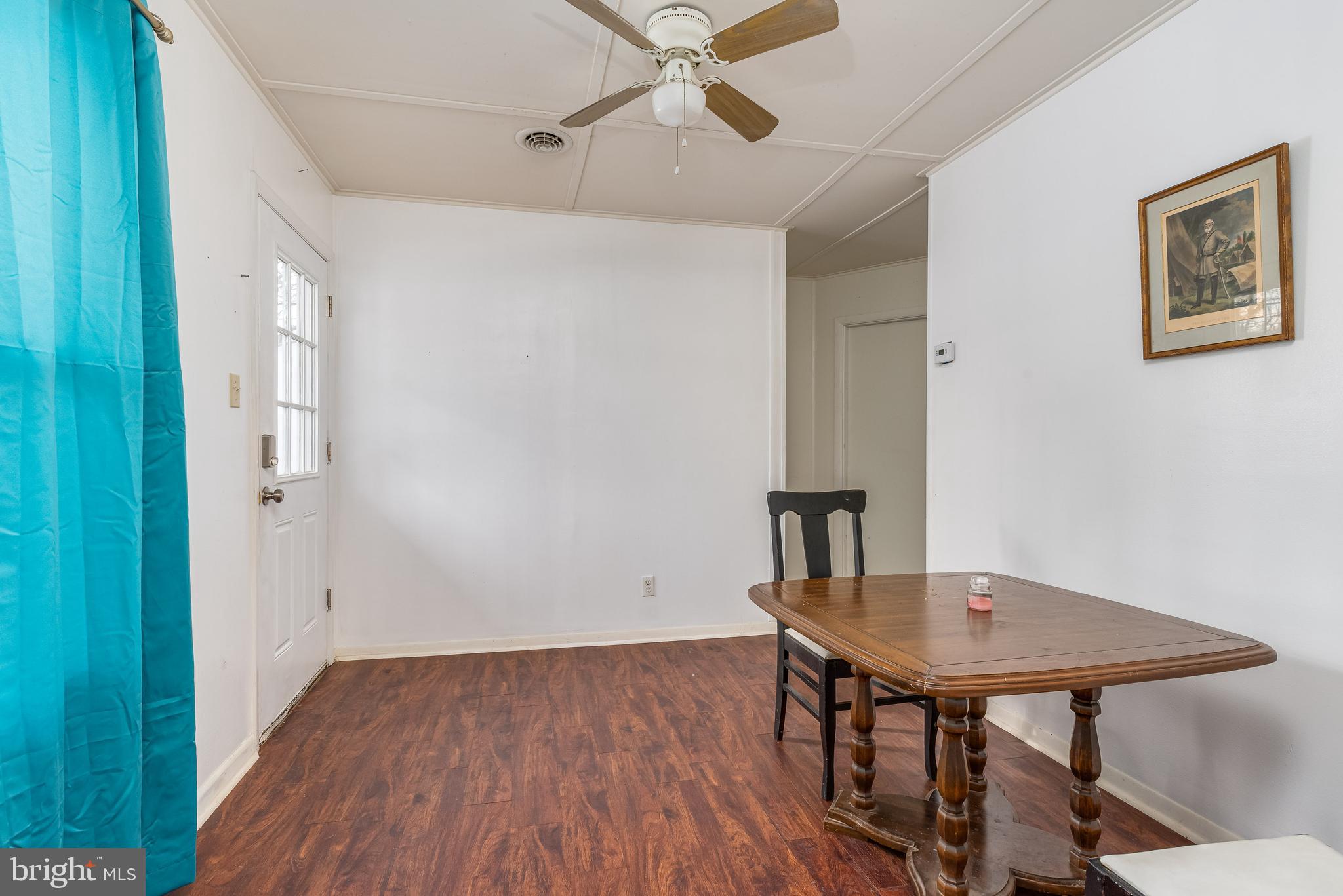 387 Gray Fox Road Harpers Ferry, WV 25425 - Photo 7 of 33 Features laminate flooring and ceiling fan fixture