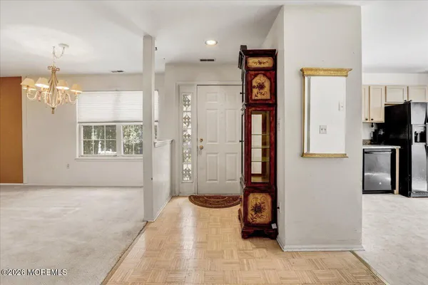 a bathroom with a glass door shower