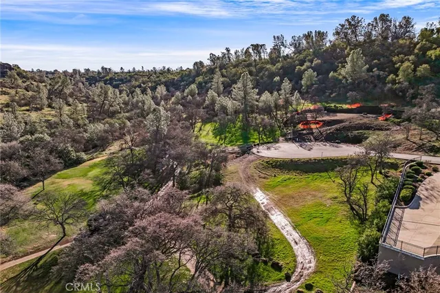 a view of a golf course with a park