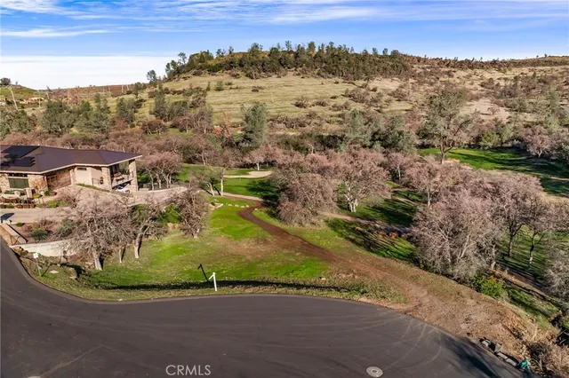 a view of balcony with a small yard