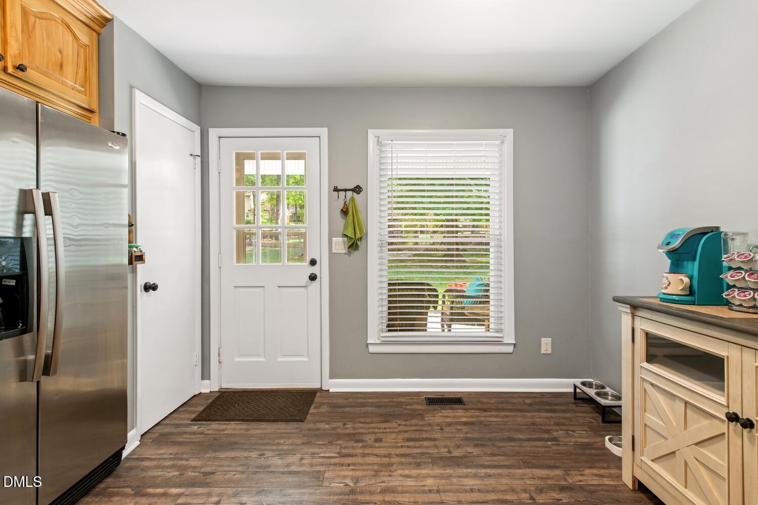 134 Longview Road Madison, NC 27025 - Photo 17 of 49 a view of an empty room with a window and wooden floor