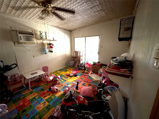 a room with toys and flat screen tv