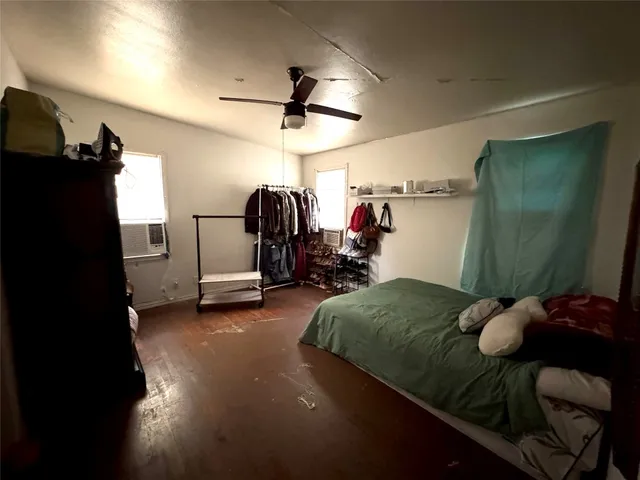 a bed room with a bed and furniture