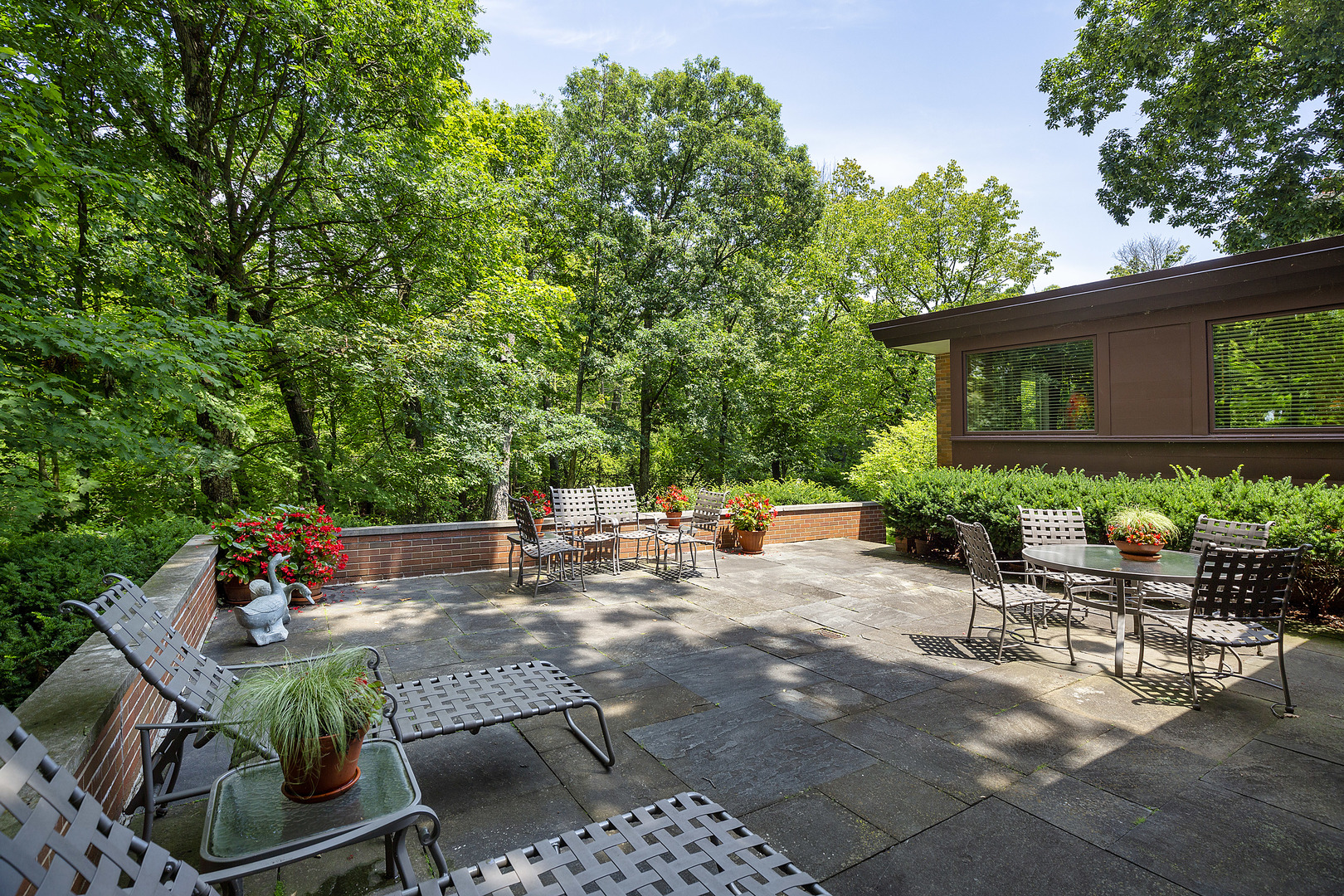 195 Franklin Road Glencoe, IL 60022 - Photo 26 of 33 a view of backyard with outdoor seating a patio and plants