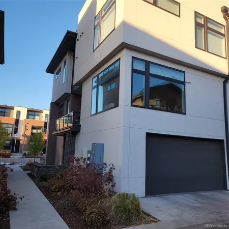 a view of a house with a street
