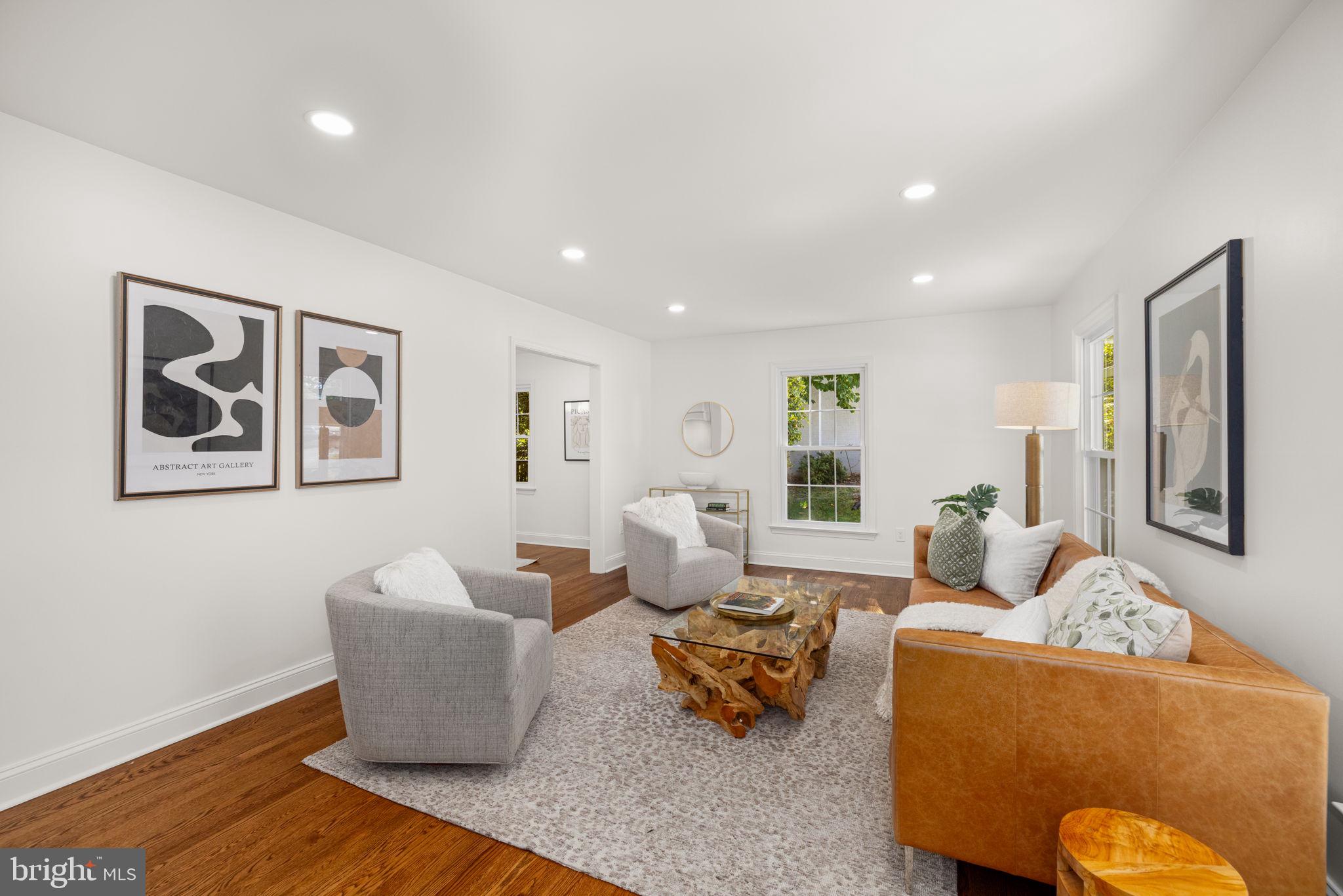 8415 Riverside Road Alexandria, VA 22308 - Photo 3 of 44 a living room with furniture and wooden floor