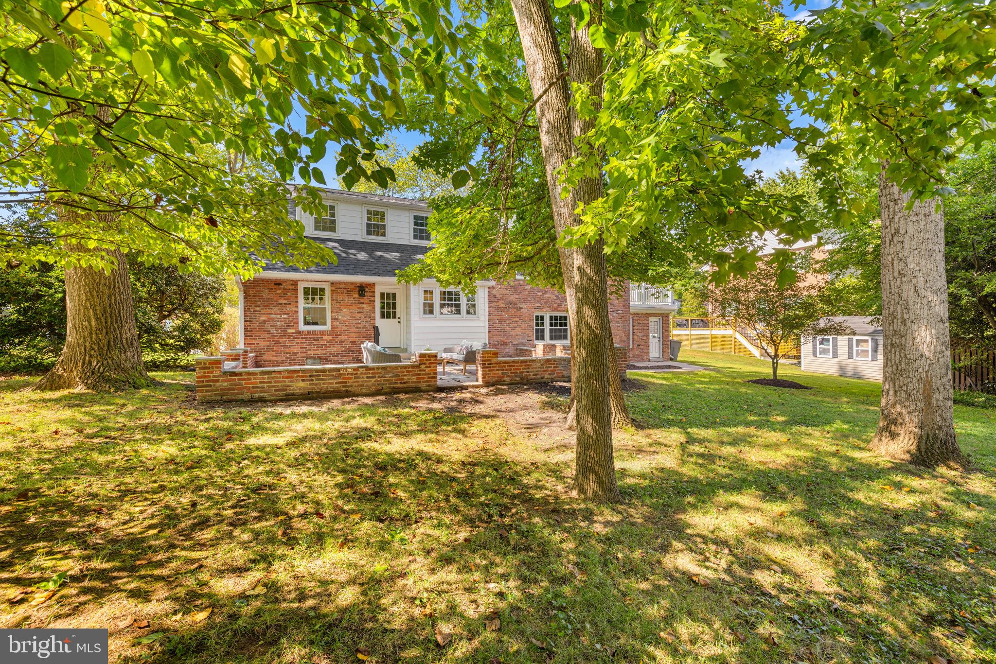 8415 Riverside Road Alexandria, VA 22308 - Photo 38 of 44 a front view of a house with a yard