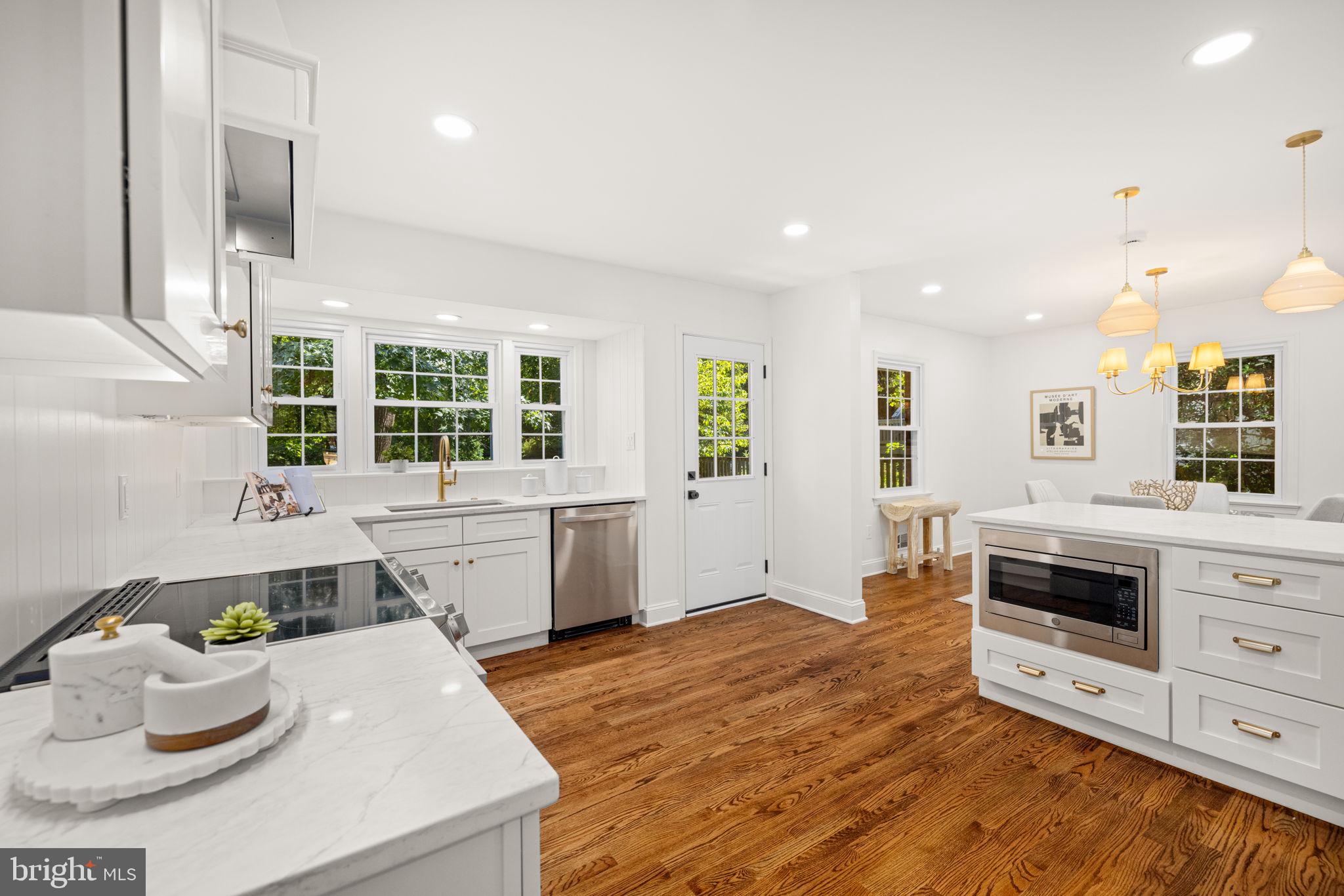 8415 Riverside Road Alexandria, VA 22308 - Photo 10 of 44 a kitchen with a stove and a sink