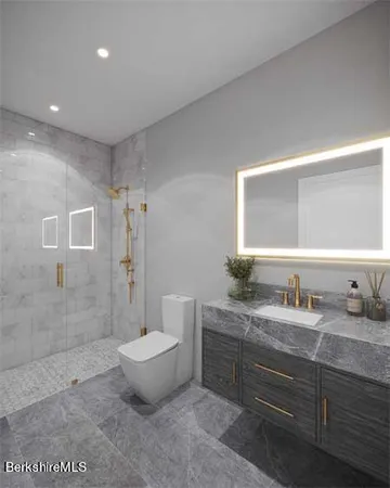 a bathroom with a granite countertop sink toilet and shower