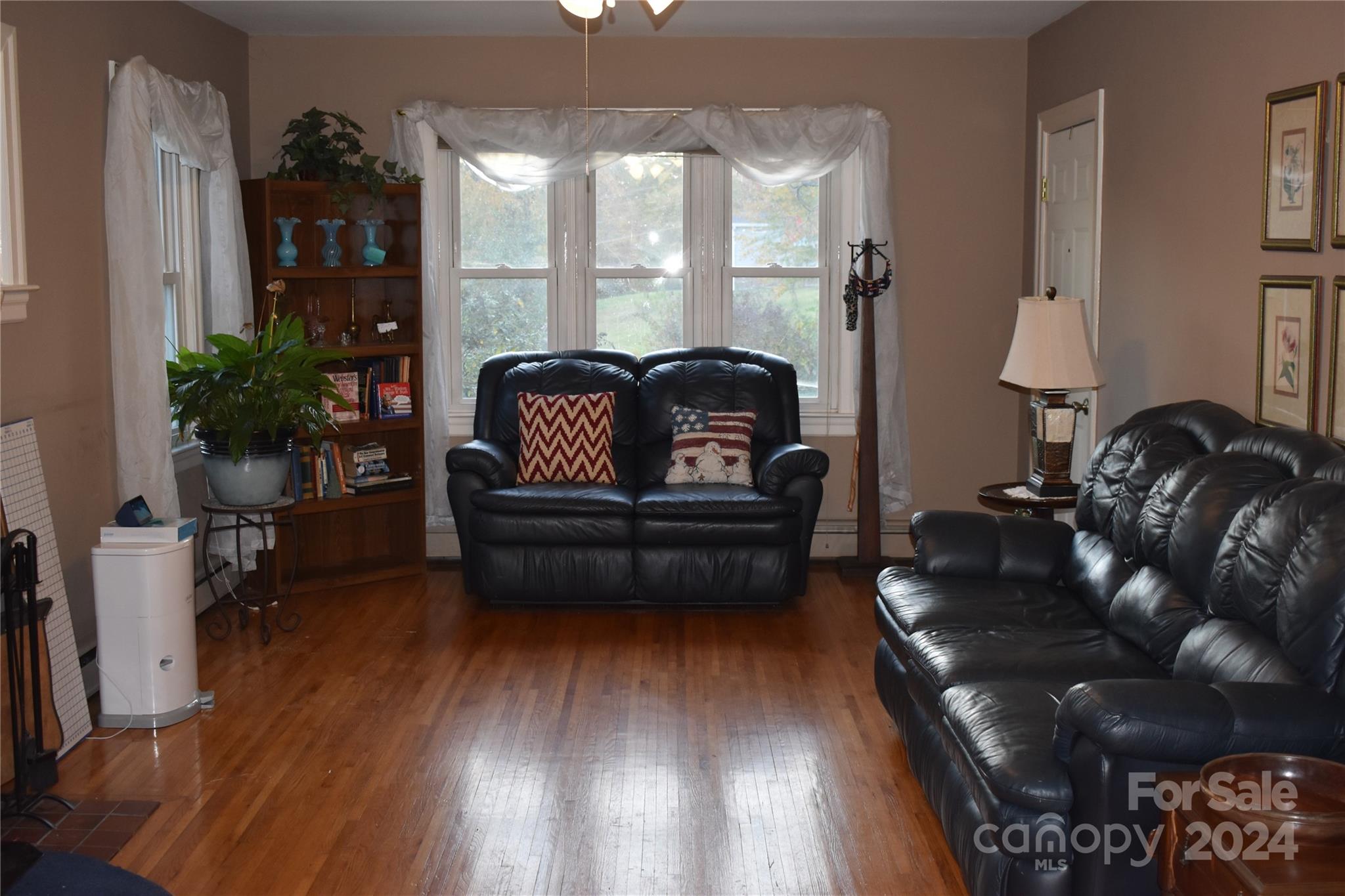 25 Cypress Road Marion, NC 28752 - Photo 15 of 48 a living room with furniture and a wooden floor