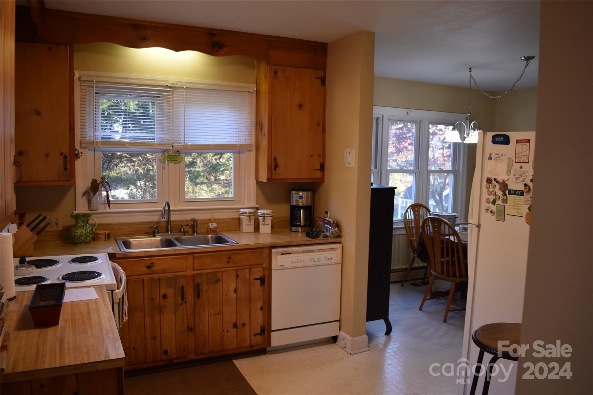 25 Cypress Road Marion, NC 28752 - Photo 17 of 48 a kitchen with a sink stove and cabinets
