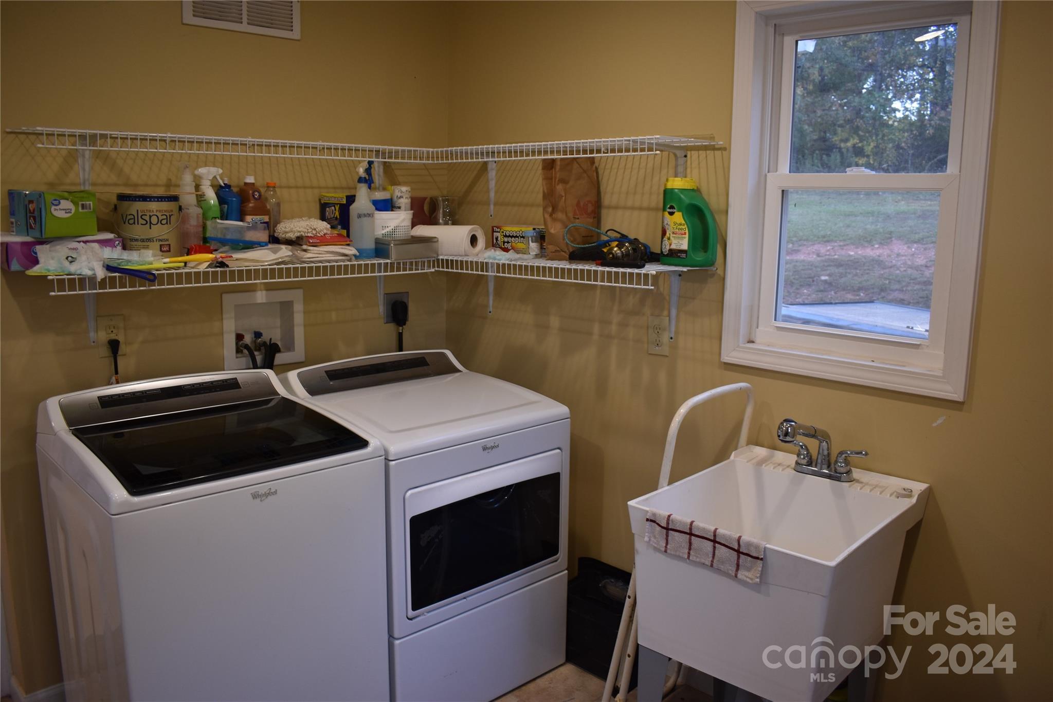 25 Cypress Road Marion, NC 28752 - Photo 21 of 48 a utility room with sink dryer and washer