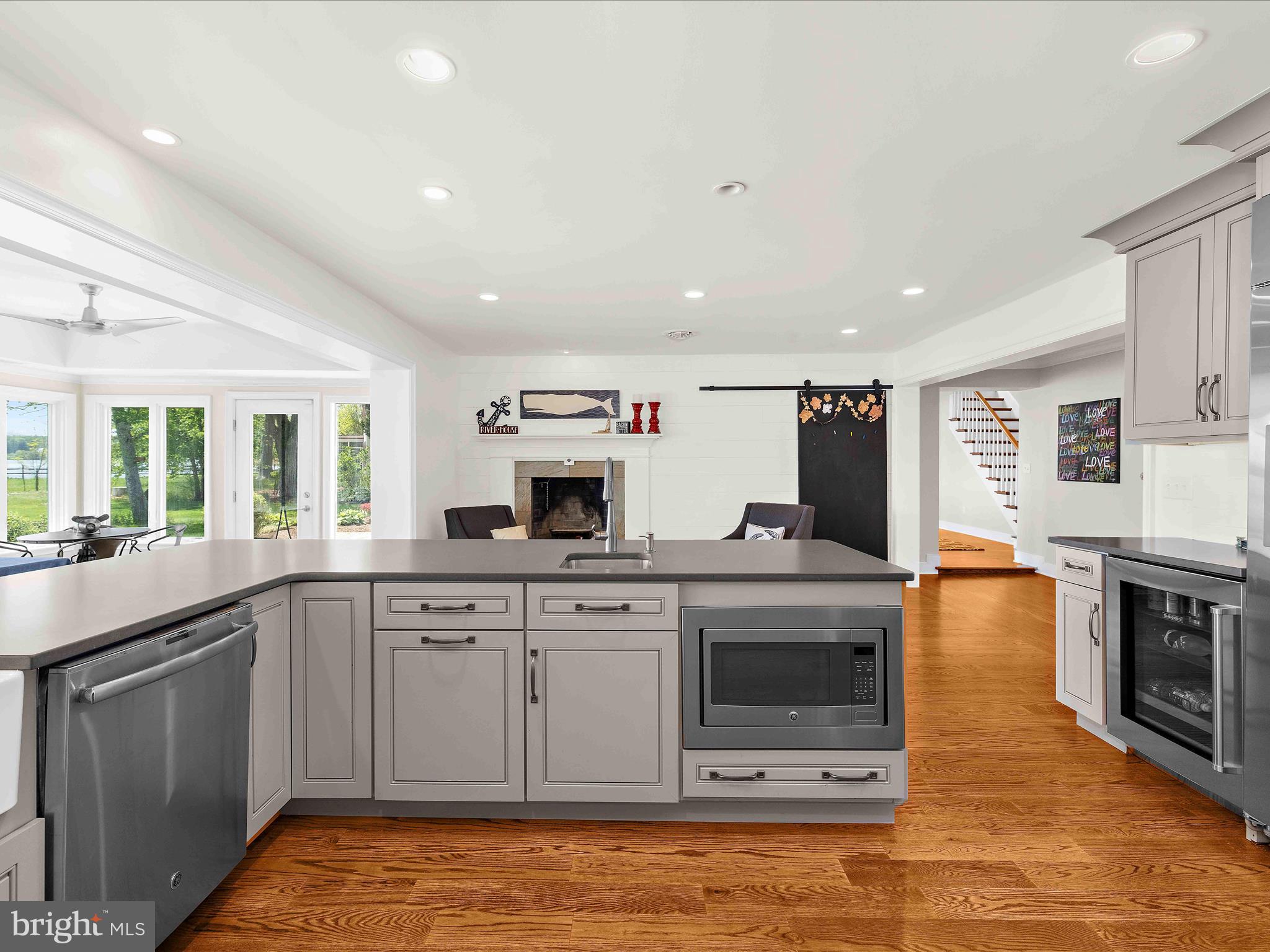 7961 Quaker Neck Road Chestertown, MD 21620 - Photo 19 of 93 a kitchen with a sink stove and cabinets