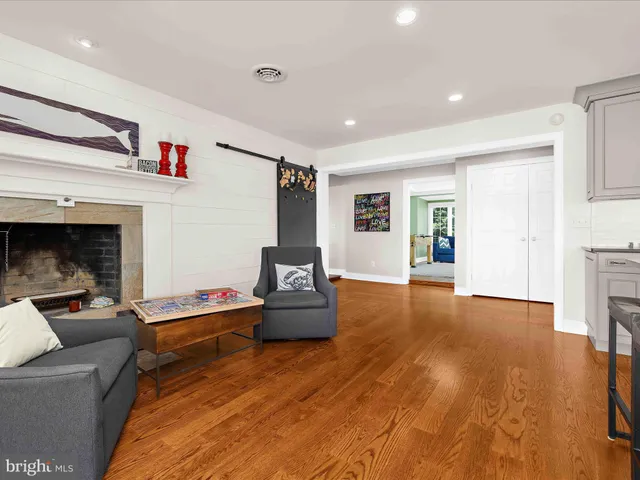 a bathroom with a shower and a sink