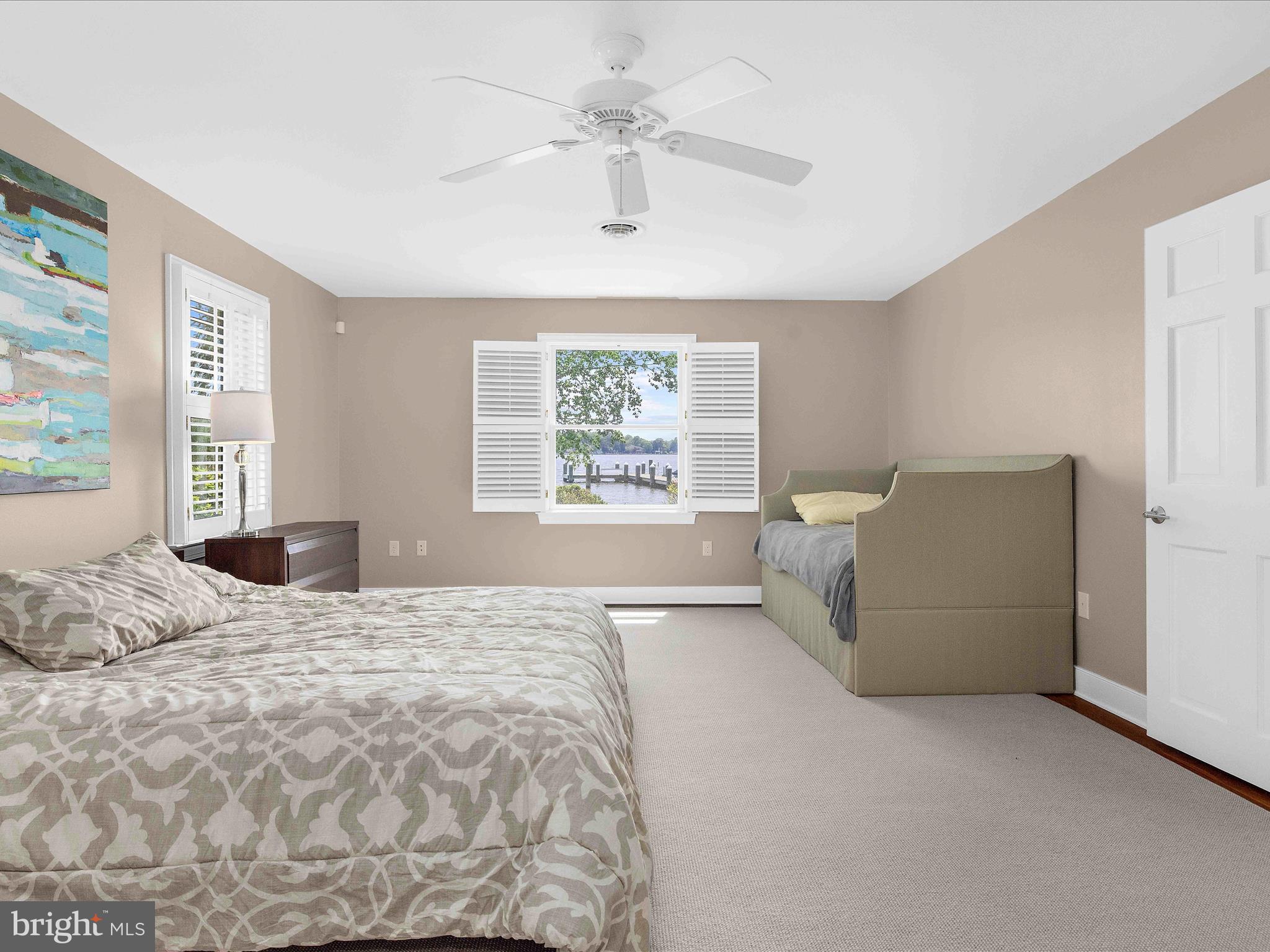 7961 Quaker Neck Road Chestertown, MD 21620 - Photo 31 of 93 a spacious bedroom with a bed and a window