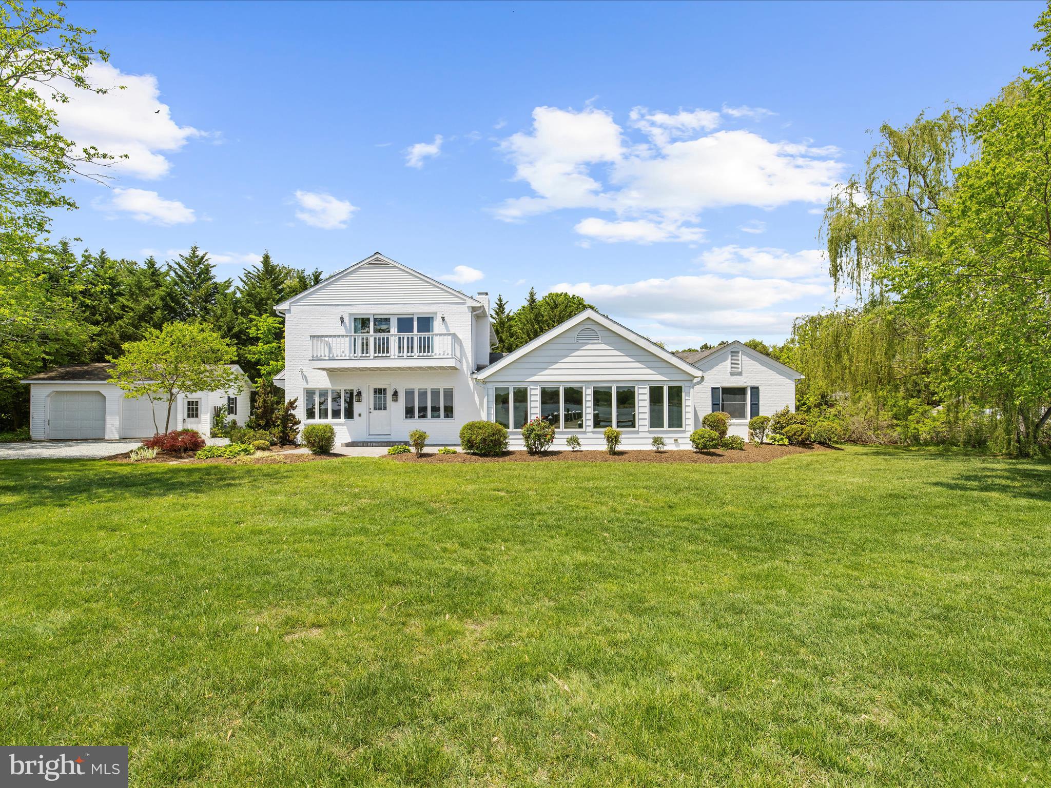 7961 Quaker Neck Road Chestertown, MD 21620 - Photo 4 of 93 a front view of a house with garden