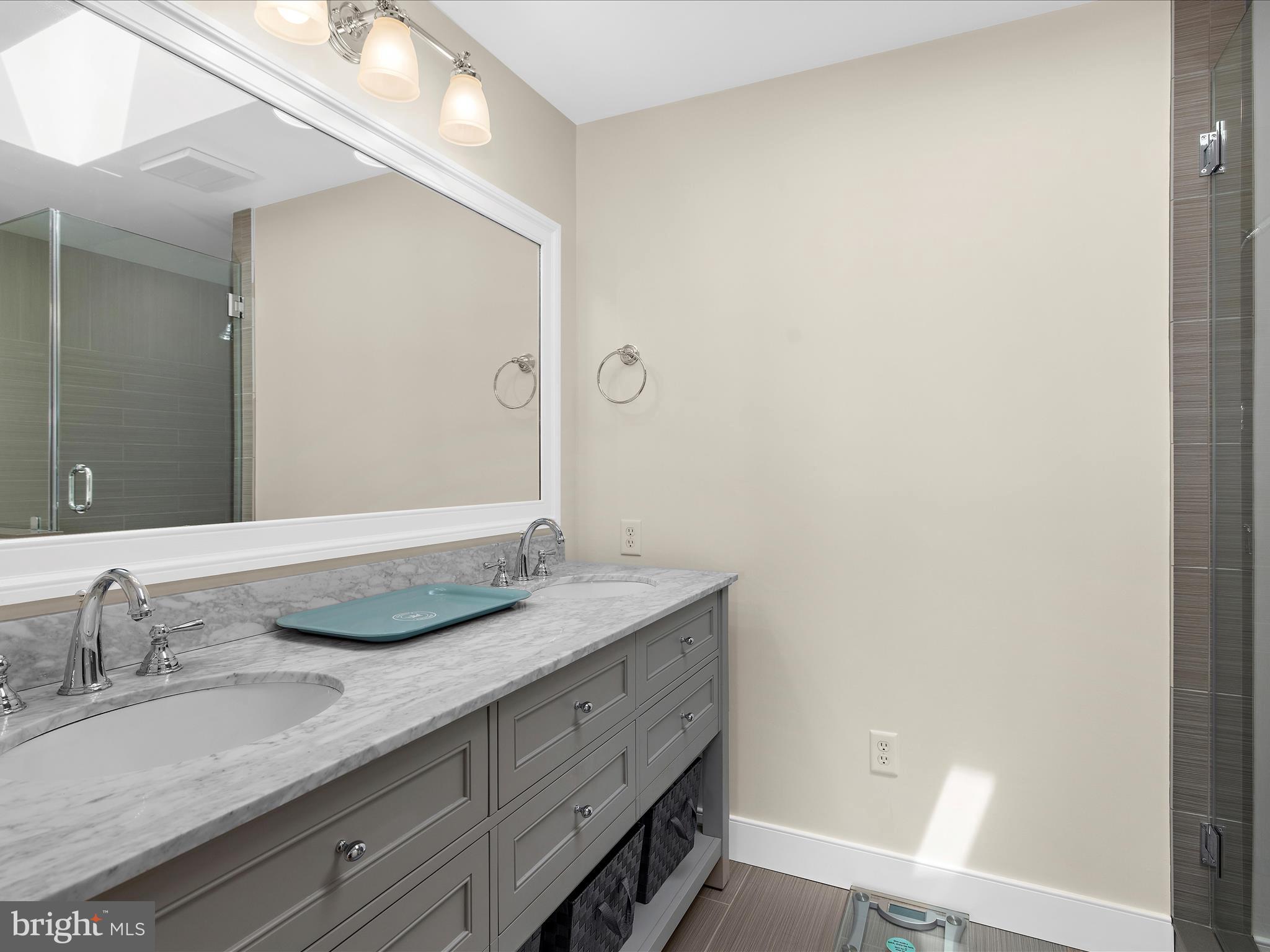 7961 Quaker Neck Road Chestertown, MD 21620 - Photo 57 of 93 a bathroom with a granite countertop sink and a mirror