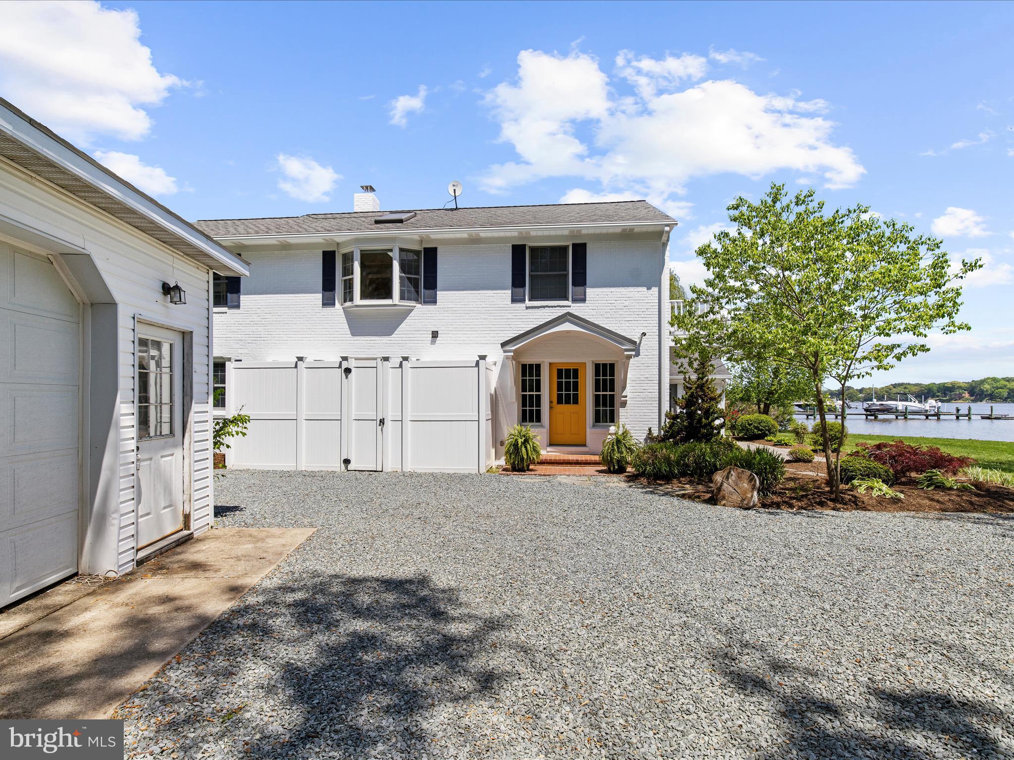 7961 Quaker Neck Road Chestertown, MD 21620 - Photo 68 of 93 a front view of a house with a yard