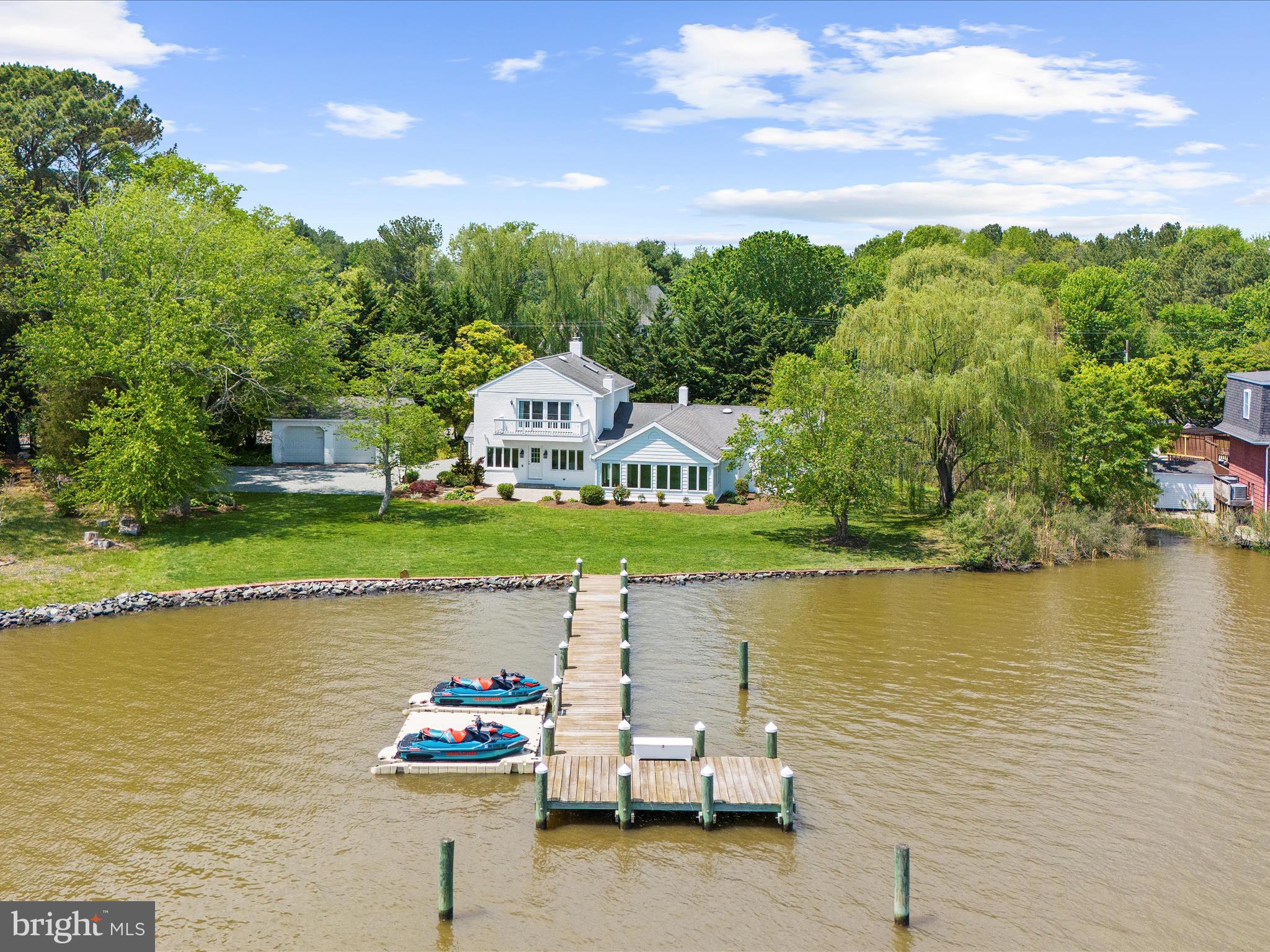 7961 Quaker Neck Road Chestertown, MD 21620 - Photo 78 of 93 a view of a lake with sitting area