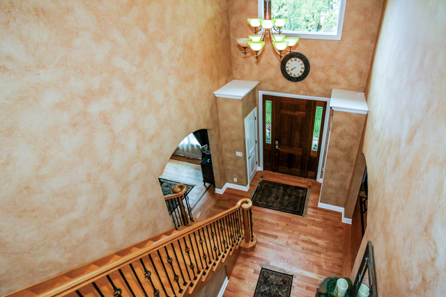 813 Elmdale Road Glenview, IL 60025 - Photo 11 of 26 a view of entryway with wooden floor