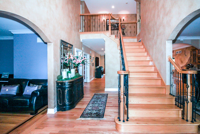 813 Elmdale Road Glenview, IL 60025 - Photo 12 of 26 a view of entryway and hall with wooden floor