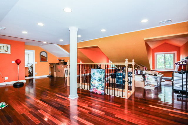 813 Elmdale Road Glenview, IL 60025 - Photo 22 of 26 a view of a lobby with furniture and floor to ceiling window