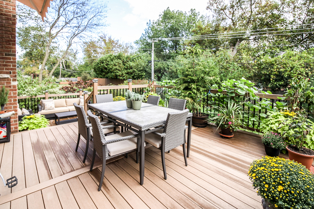 813 Elmdale Road Glenview, IL 60025 - Photo 25 of 26 a view of a chairs and table on the wooden deck