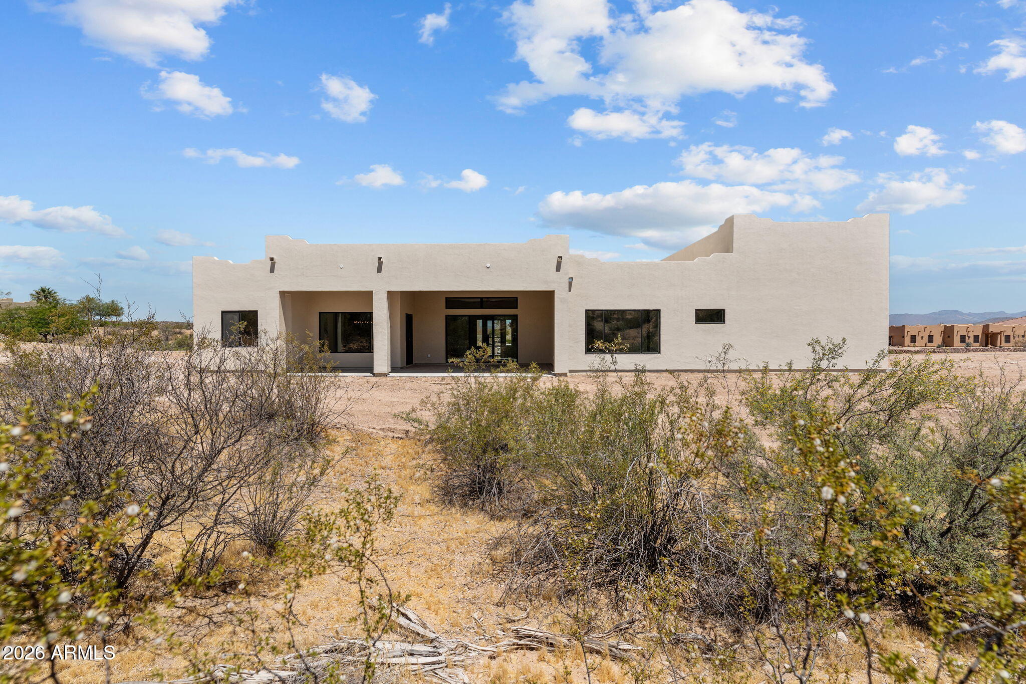 2855 Percheron Road Wickenburg, AZ 85390 - Photo 52 of 58 a outdoor view of house with green space