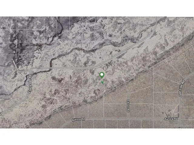 a black and white photo of a house