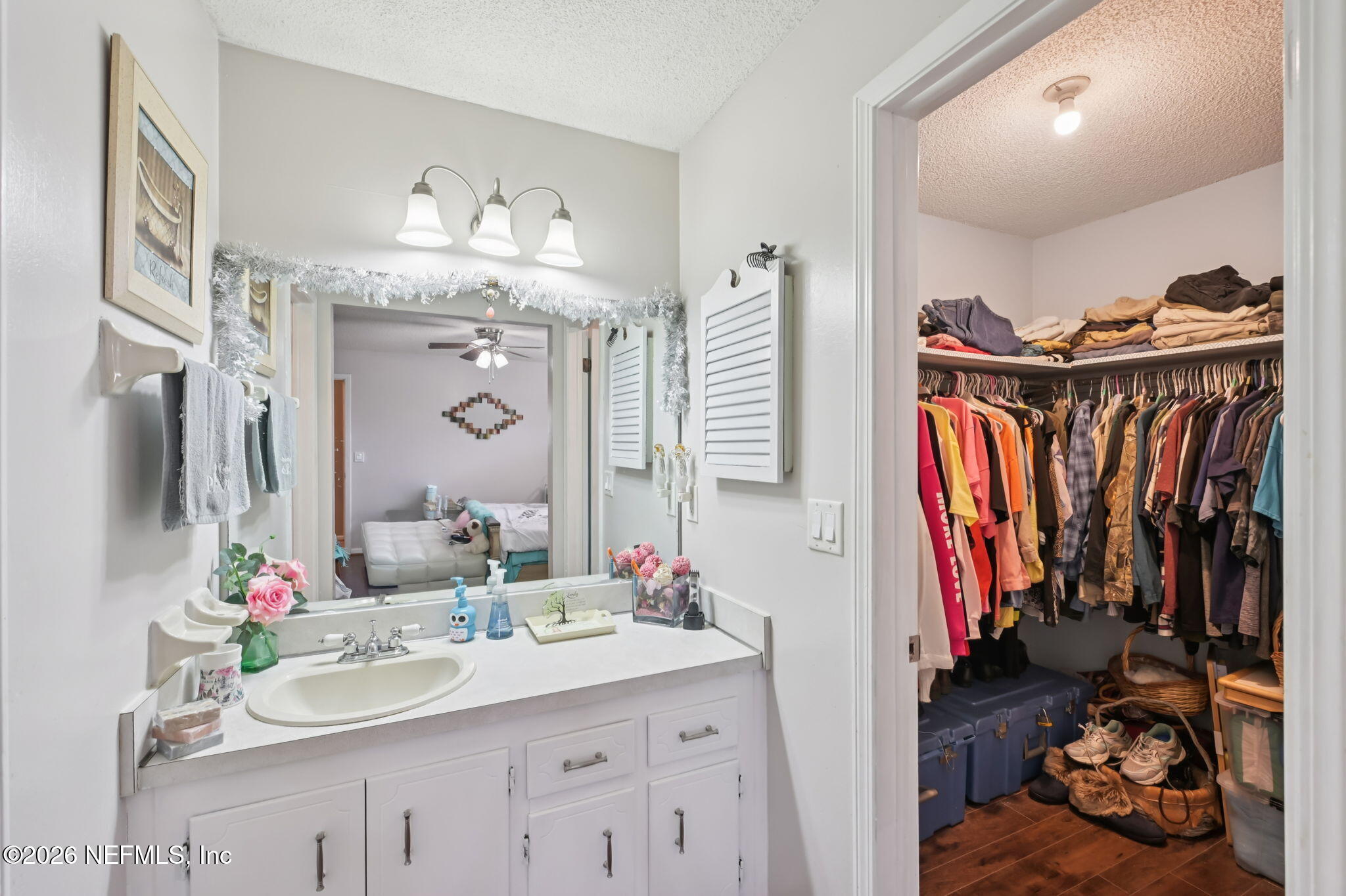 2749 Richards Road Orange Park, FL 32073 - Photo 13 of 26 a bathroom with a sink double vanity and a mirror