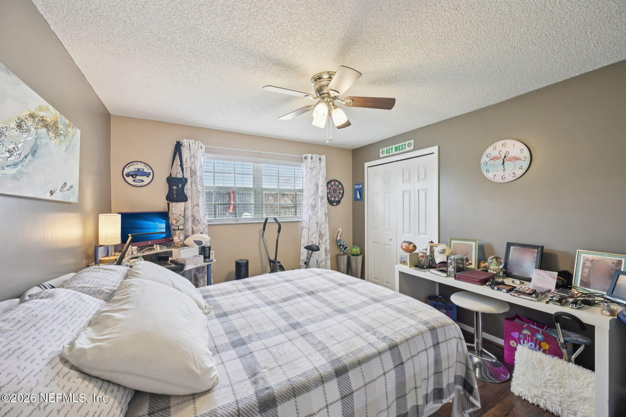 2749 Richards Road Orange Park, FL 32073 - Photo 14 of 26 a bed room with a bed and a desk