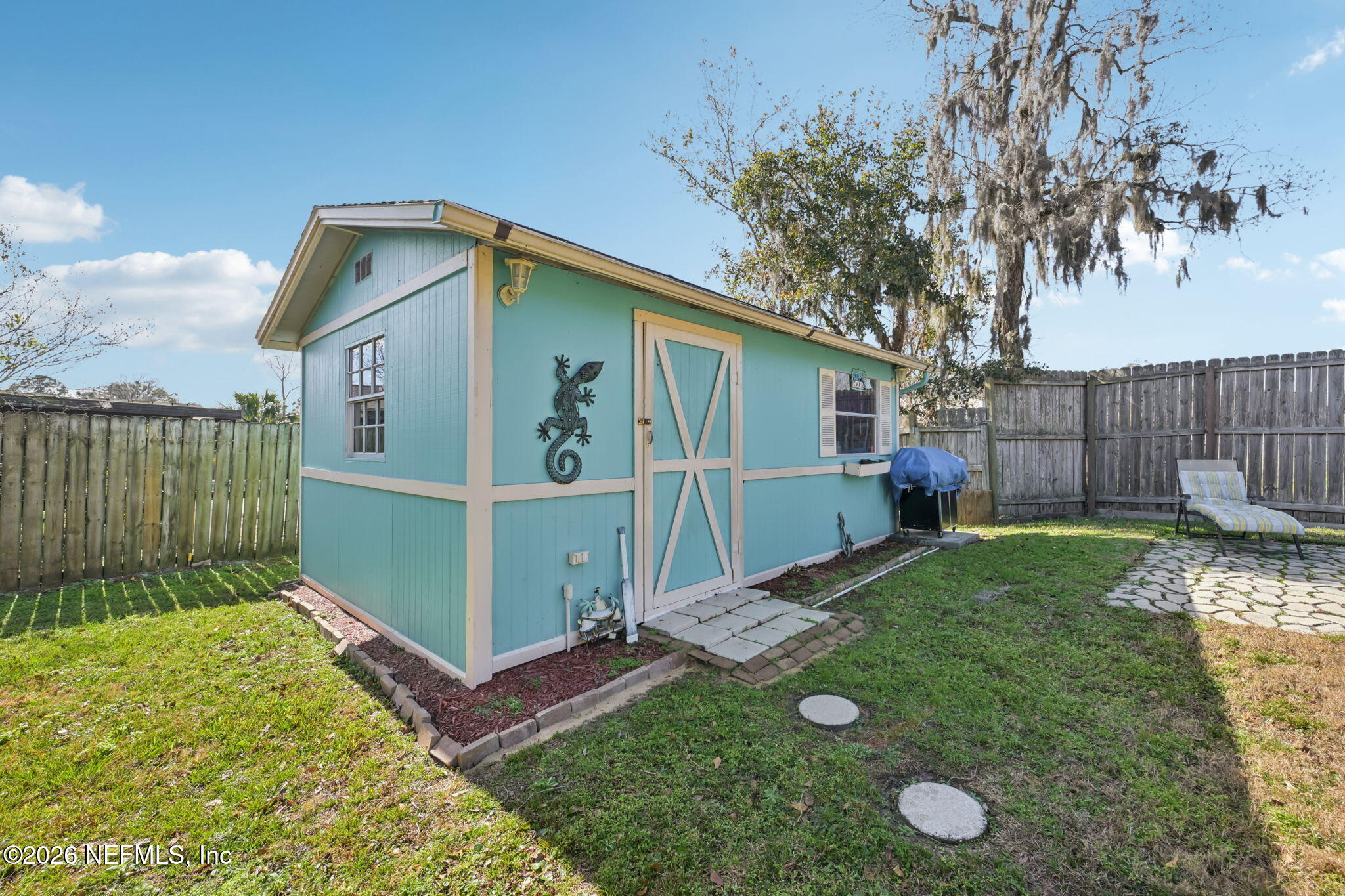 2749 Richards Road Orange Park, FL 32073 - Photo 20 of 26 a view of a backyard with a tree