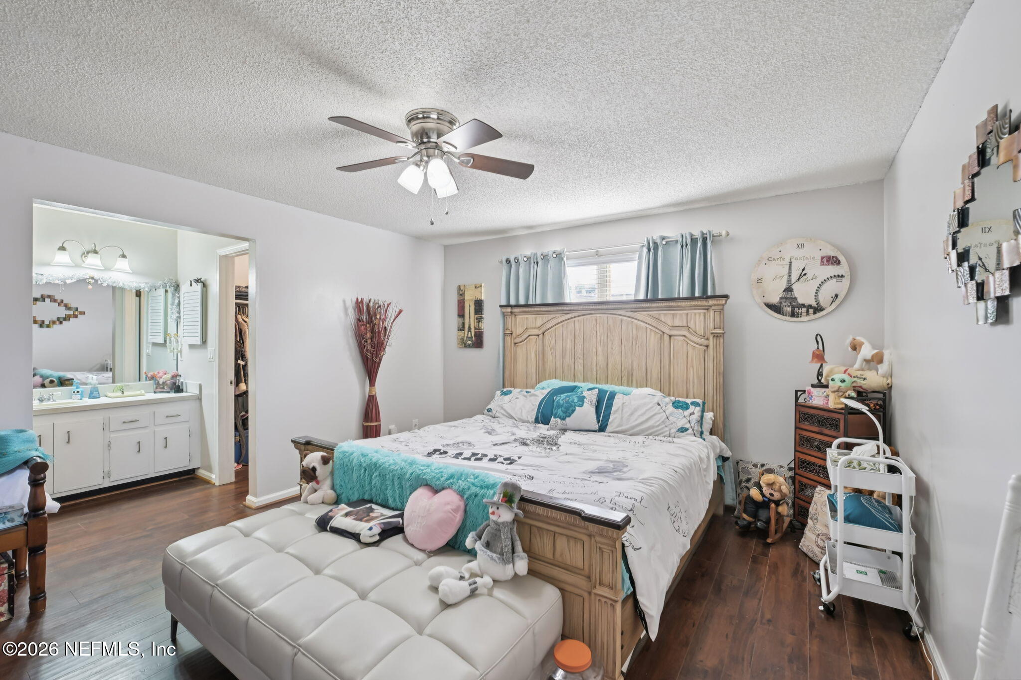 2749 Richards Road Orange Park, FL 32073 - Photo 10 of 26 a bedroom with a bed and ceiling fan