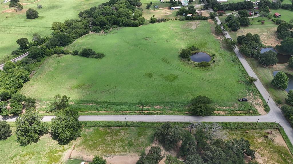 Lot 3 New Hope Road Aubrey, TX 76227 - Photo 6 of 8 a view of a green yard