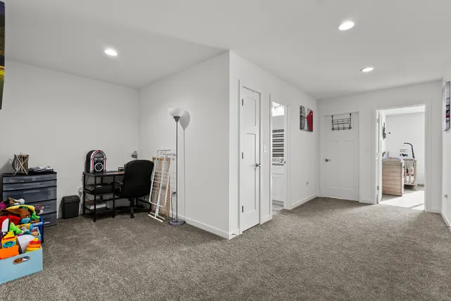 a view of a workspace with furniture