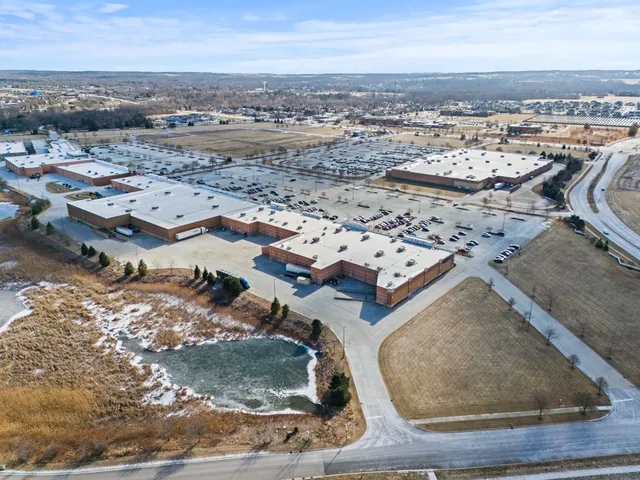 an aerial view of a house with a ocean view