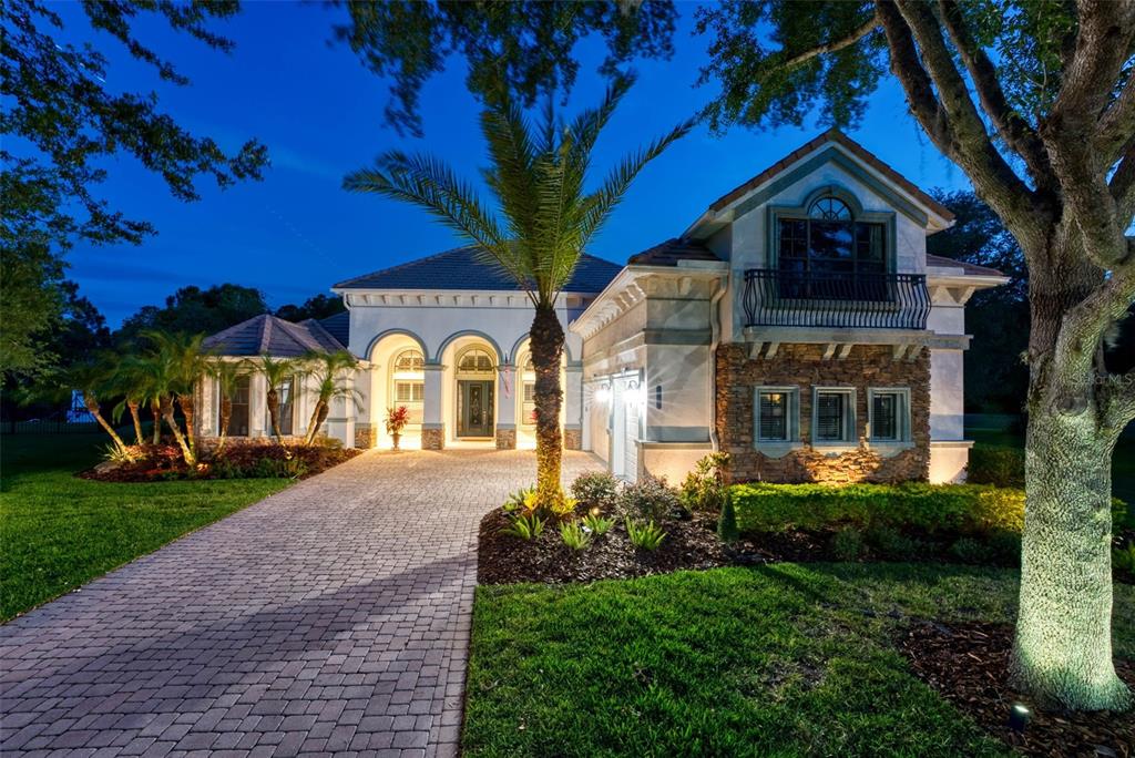 INCREDIBLE ESTATE HOME FOR SALE IN THE BEAUTIFUL GUARD GATED COMMUNITY OF GRAND HAMPTON!