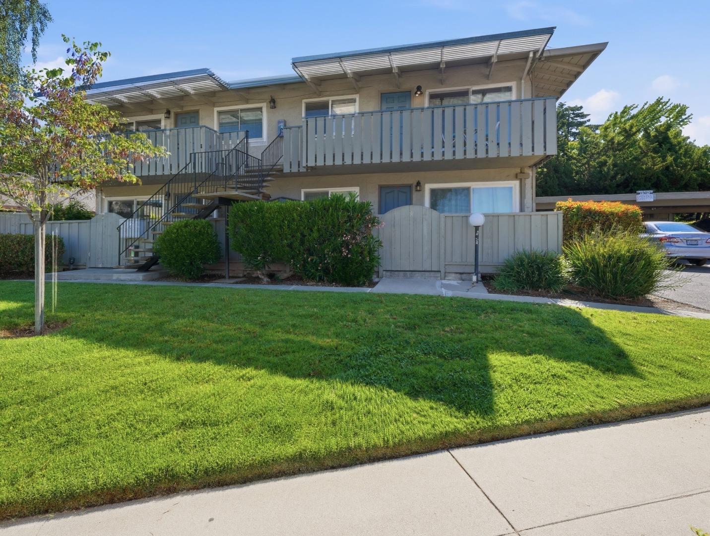 607 Valley Forge Way, Unit 4 Campbell, CA 95117 - Photo 1 of 12 a view of a house with a yard