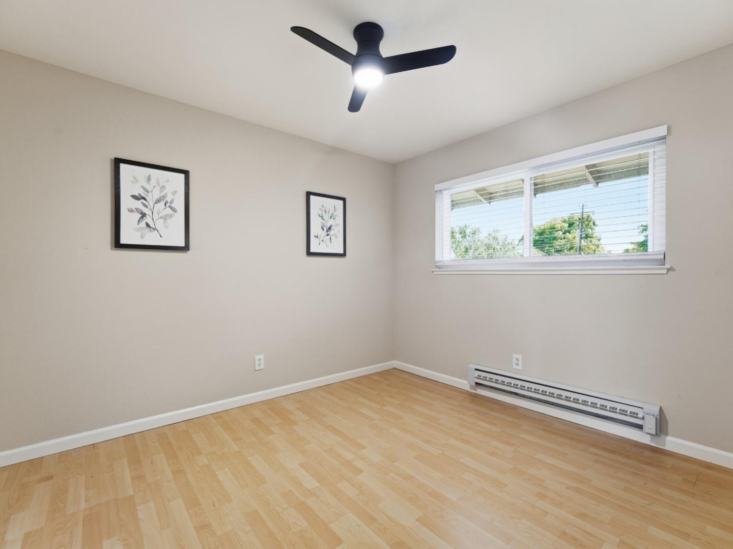 607 Valley Forge Way, Unit 4 Campbell, CA 95117 - Photo 12 of 12 a view of room with window and ceiling fan