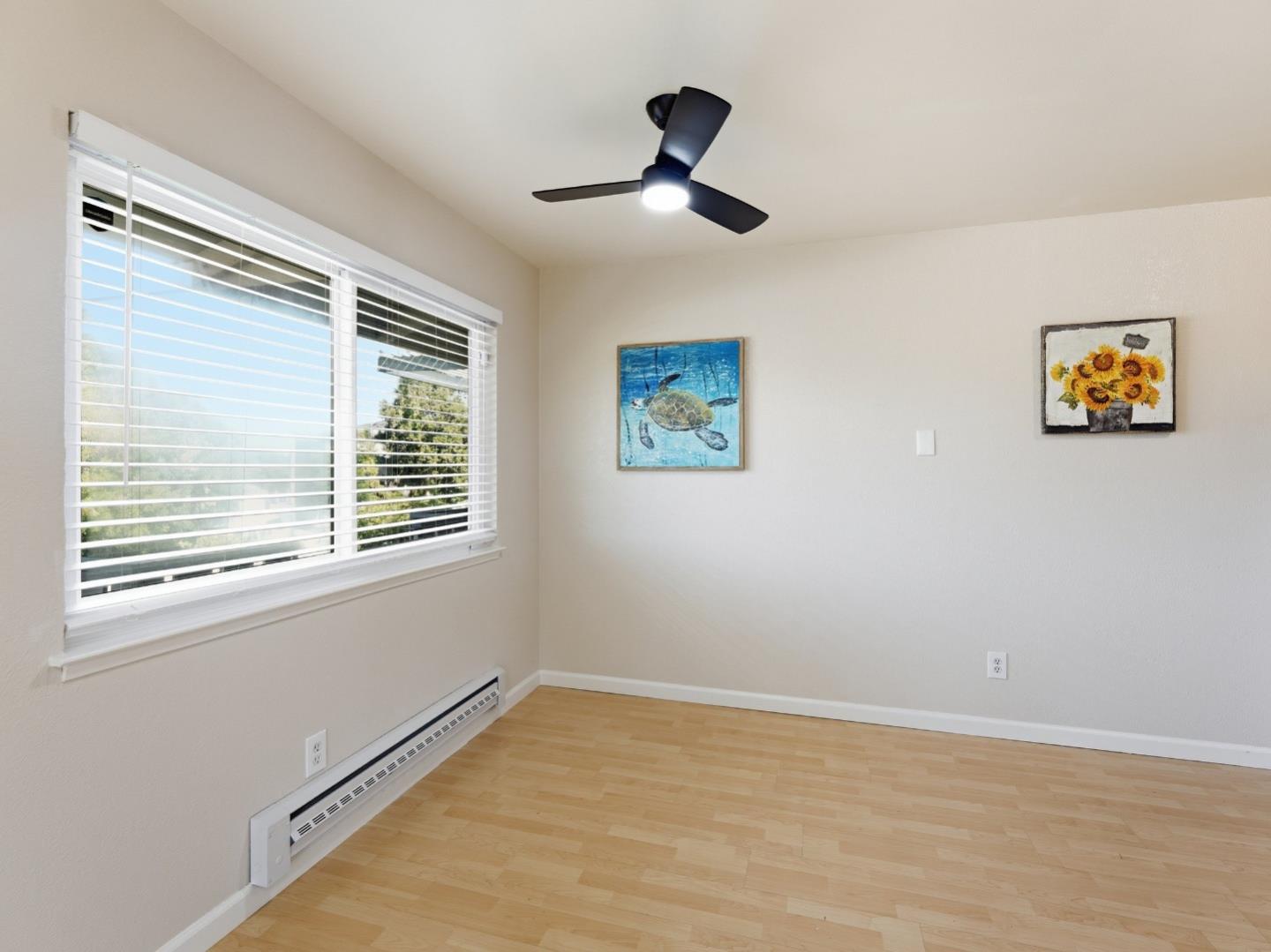 607 Valley Forge Way, Unit 4 Campbell, CA 95117 - Photo 4 of 12 a view of empty room with ceiling fan